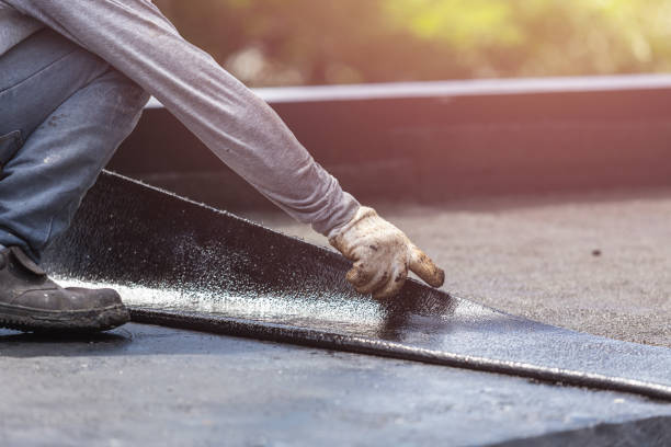 Professional Waterproofing technician working in Norwood, NC